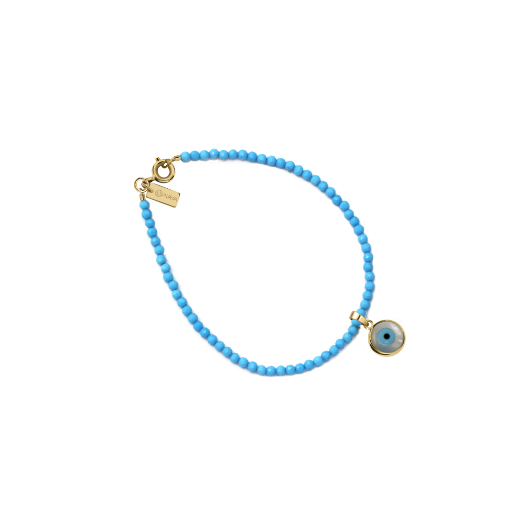 Turquoise beaded bracelet with charm