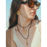Swirl shell earring