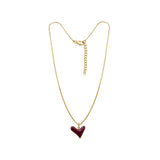Reversible heart necklace with engraving