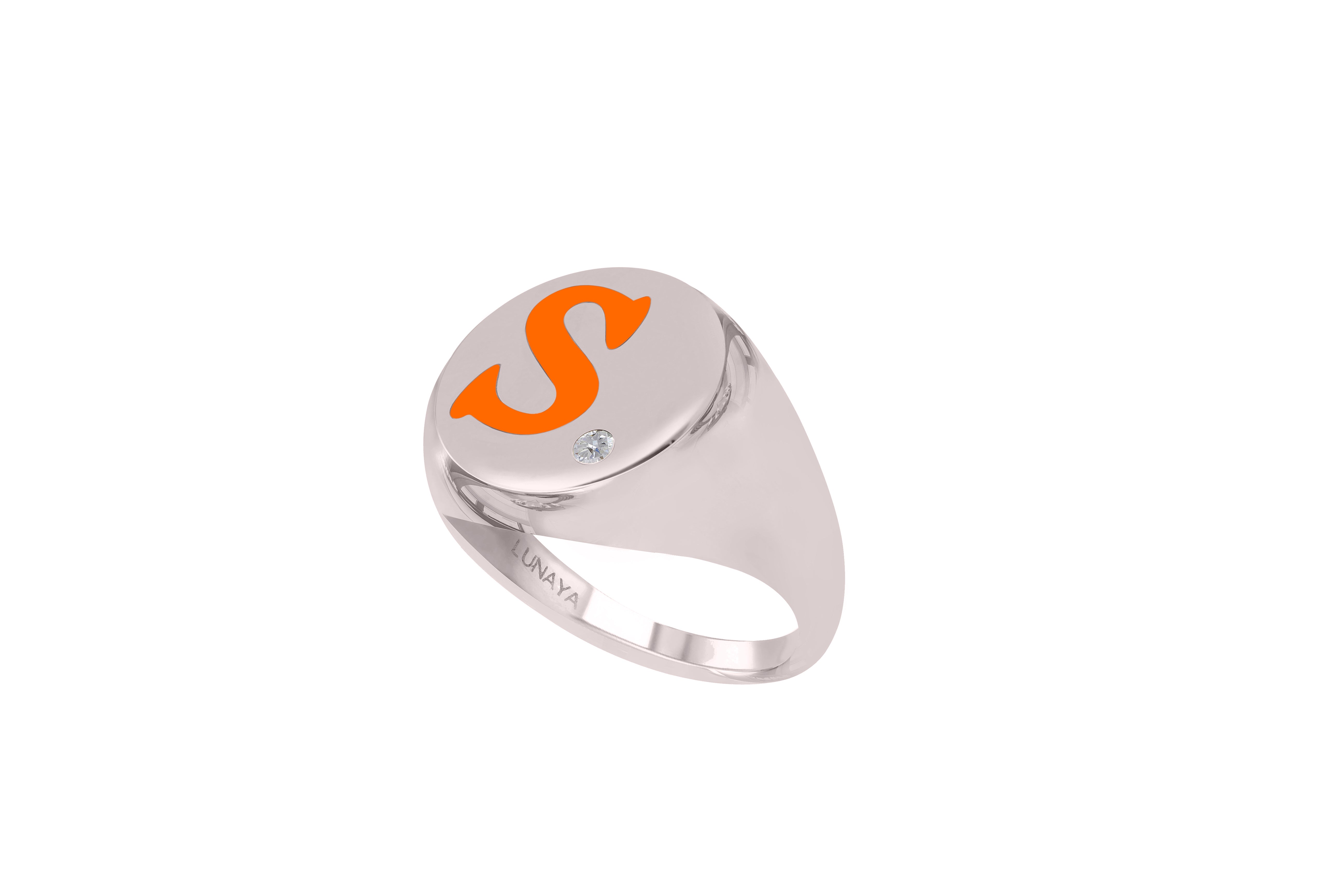Silver-plated signet ring with an orange hand-painted initial 'S' and a small round cubic zirconia accent stone