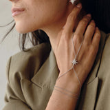 Model wearing the Tara Hand Chain, star on the back of the hand