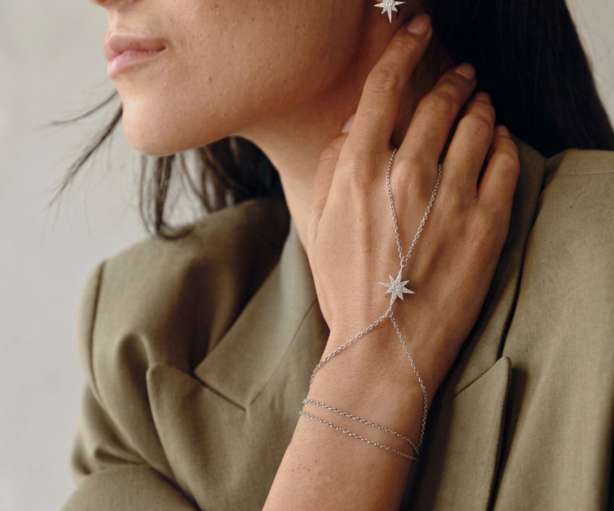 Model wearing the Tara Hand Chain, star on the back of the hand